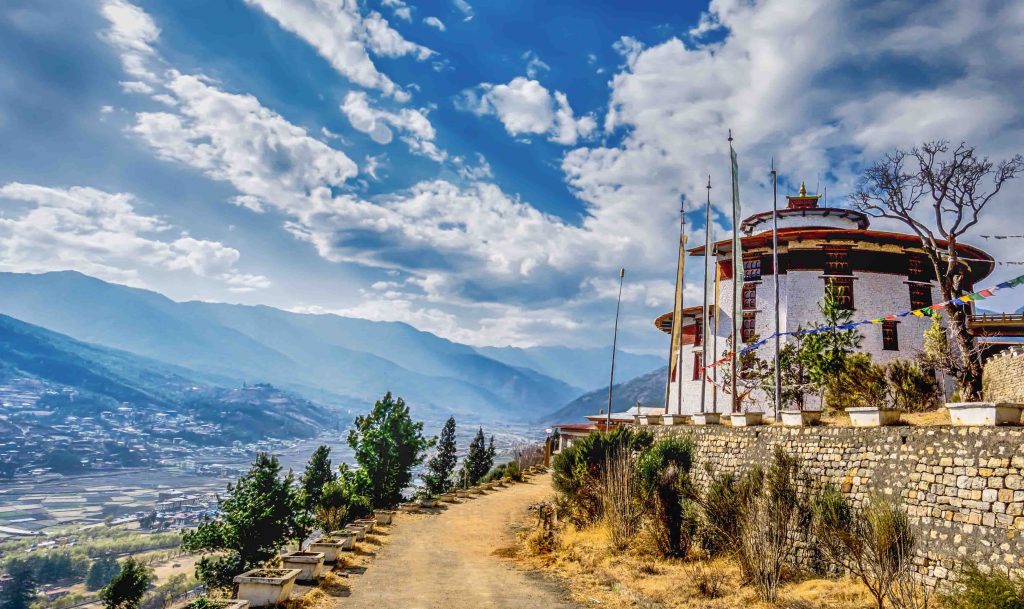 mountain-village-with-rural-road-on-a-sunny-summer-day-Bhutan